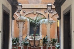 One of many courtyard views seen from the sidewalk.