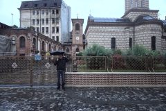 John keeping dry at Old Princely Court in old town Bucharest.